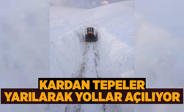 Kardan tepeler yarılarak yollar açılıyor