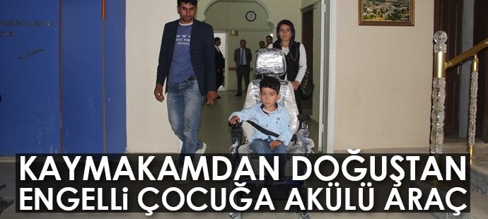 Kaymakamdan doğuştan engelli çocuğa akülü araç