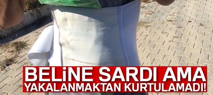 Beline sardığı 1 kilo 660 gram esrar ile yakalandı